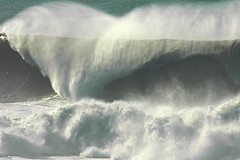 Wave.  Photograph of a wave with rather impressive energy.  This icon represents the wave energy captured by Dam-Atoll.  Title:  40' Closeout.  ©eggz; eggz references a user id on Flickr.  Image used with his kind permission.  Flickr address:  http://www.flickr.com/photos/eggz/82357672/;  Flickr location: http://farm1.static.flickr.com/40/82357672_b57ca48c12_m.jpg